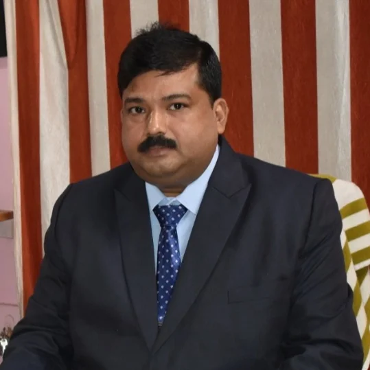 Dr. Madan Banik - Director & Supporter